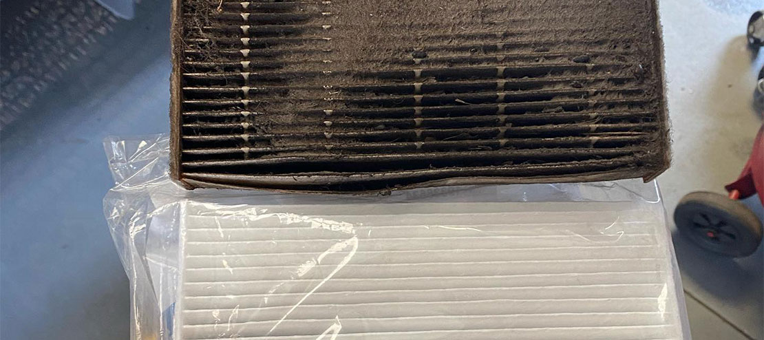 Clogged, dirty cabine fitler vs. fresh cabin fitler. A clean cabin filter filter is essential for a wowkign AC system. Concept image of “Top 4 Signs You Need Car AC Service” | Griffis Automotive Repair in Orlando, FL.
